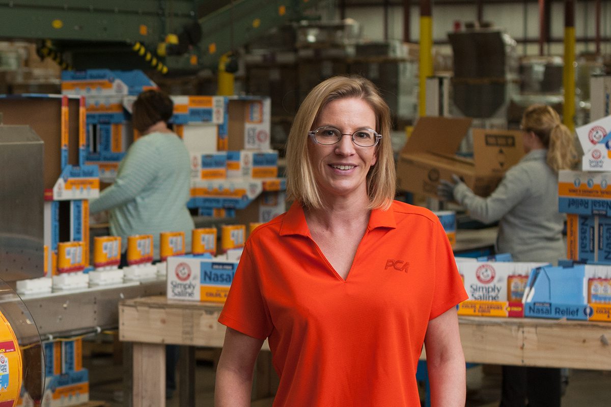 Woman in Front of Fulfillment Line