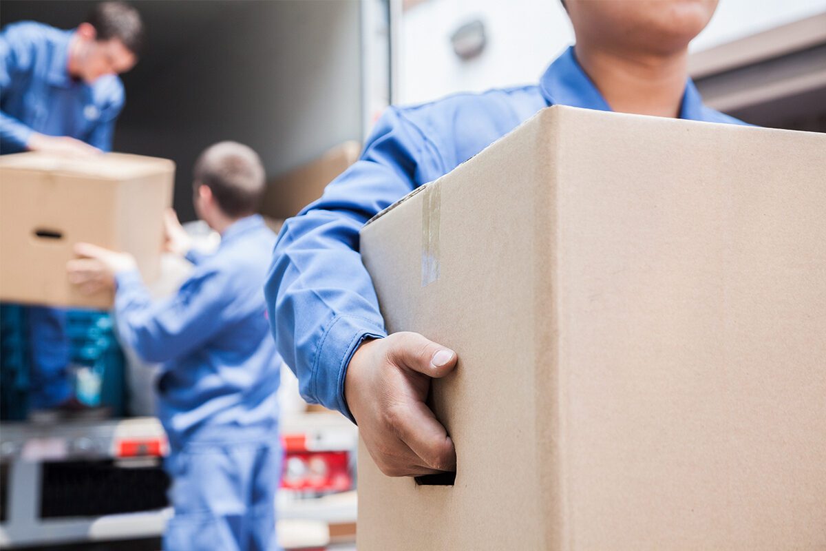 Man Carrying a Box