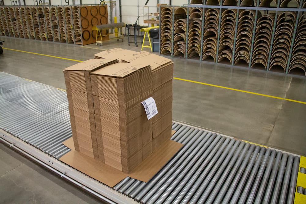 unit load of boxes on a conveyor