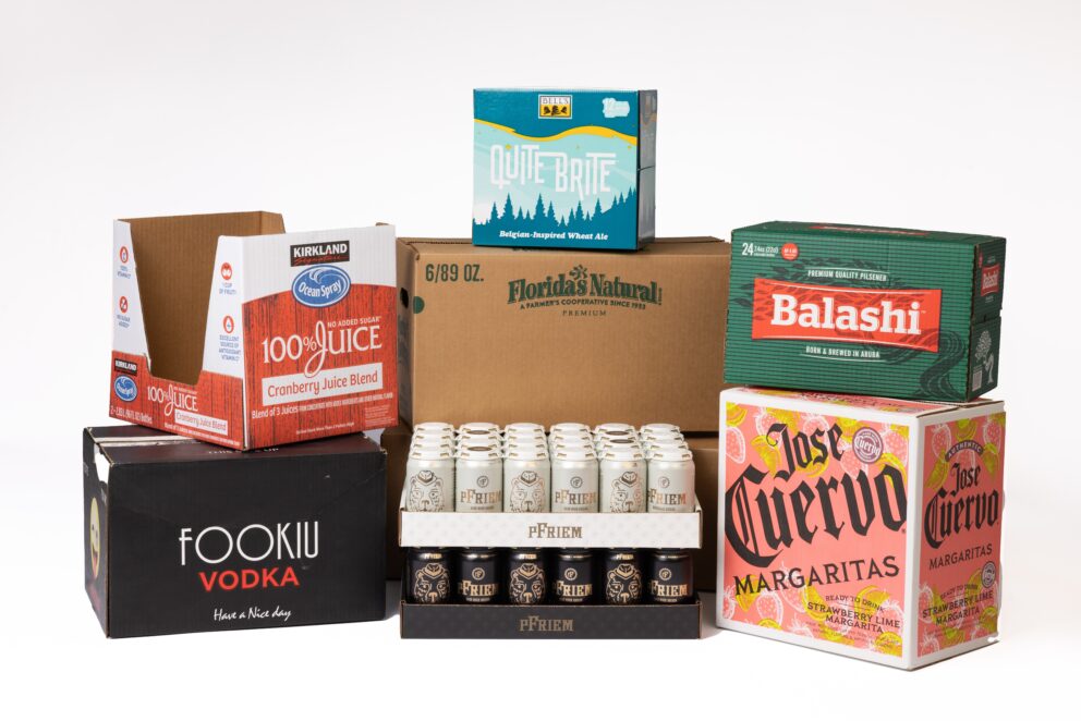 Grouping of corrugated boxes and trays for a variety of beverage types.