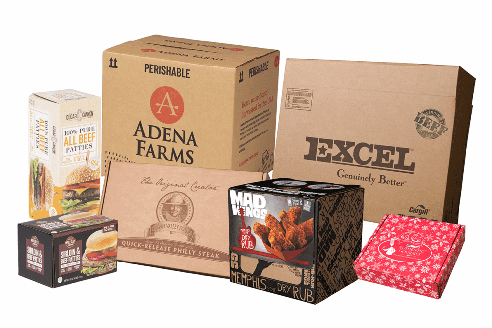 A grouping a corrugated meat boxes, varying in size, print style color and flute profile.